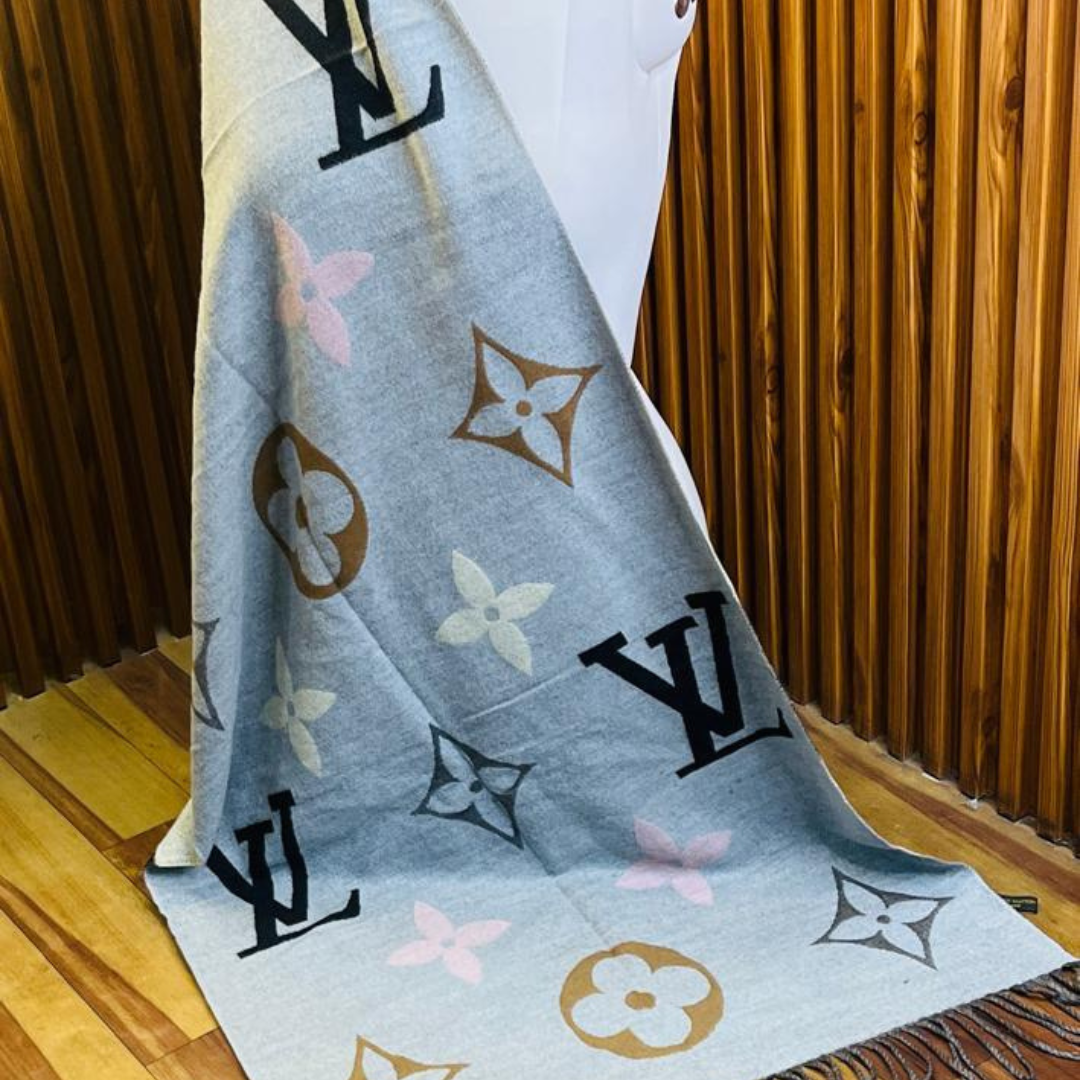 Louis Vuitton Stole With a Light Blue, Gray, And Multicolor Monogram Pattern