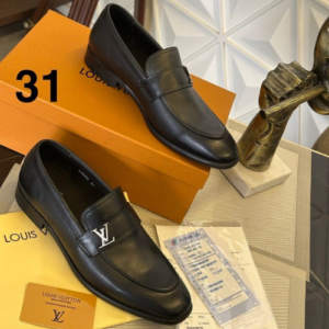 Louis Vuitton Loafers with a Black Embossed Pattern
