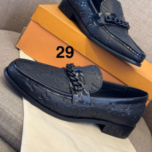 Louis Vuitton Loafers with a Black and Gray Monogram Pattern